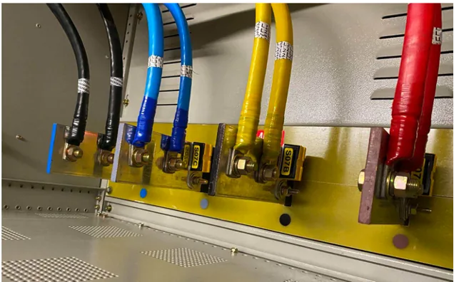 RFID thermal sensors installed at cable terminations inside a switchboard